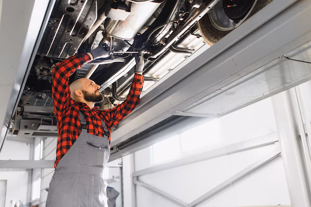 mechanic doing vehicle maintenance